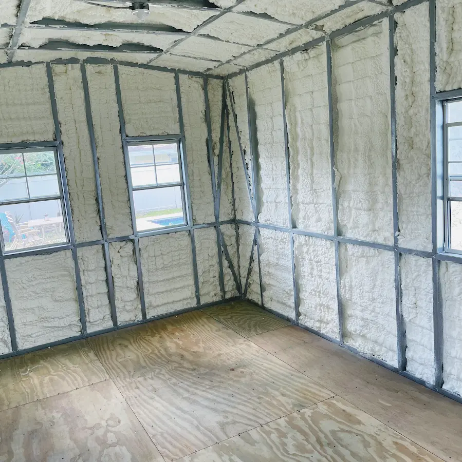 Closed-cell spray foam insulation applied to wall cavities in a residential project in Columbia City